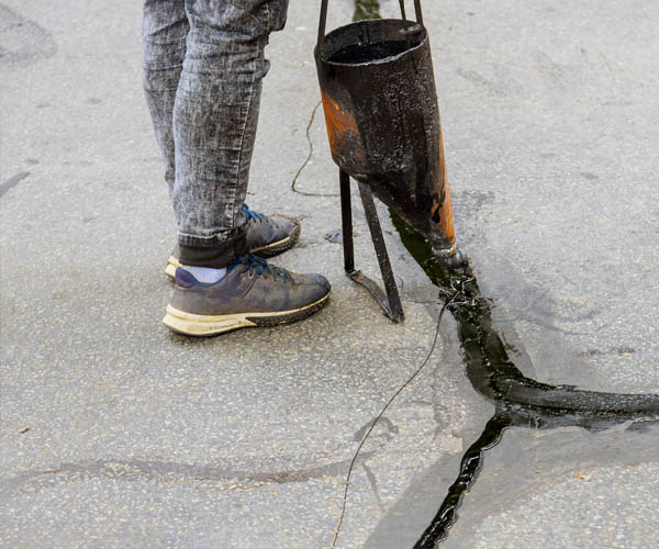 Seal Coating & Crack Filling – The American Asphalt Paving Co.